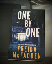 One by One Book by Freida McFadden_img_0