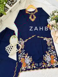 Husn Malaika💙🧡_img_0