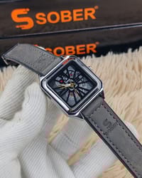 SOBER Wrist Watch with a square, skeleton dial and leather-look strap._img_2