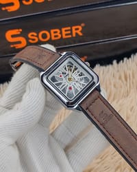 SOBER Wrist Watch with a square, skeleton dial and leather-look strap._img_3