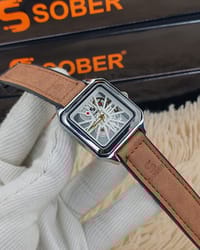 SOBER Wrist Watch with a square, skeleton dial and leather-look strap._img_4