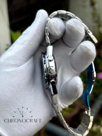 Omega Speedmaster Snoopy 50th Edition Chronograph stainless steel AA_img_1