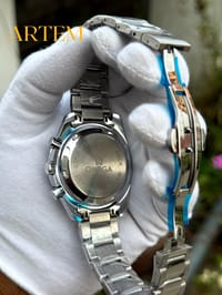 Omega Speedmaster Snoopy 50th Edition Chronograph stainless steel AA_img_2