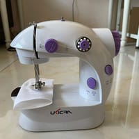 Portable Mini Sewing Machine – Dual-Speed, LED Light, Foot Pedal, Thread Cutter, 25 Threads – Compact Electric Stitch Tool for Beginners & Home Use_img_1