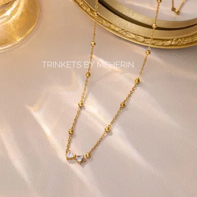 Minimal bow pendant