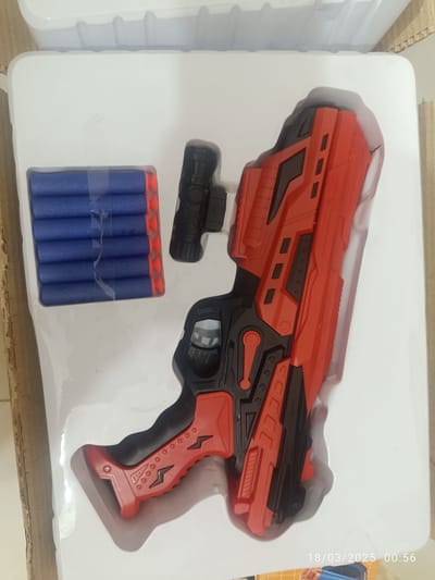 Rubber bullet gun with laser light