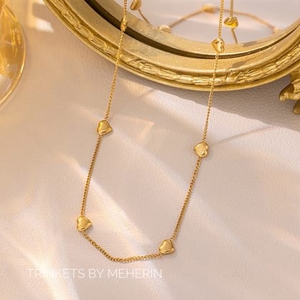 Gold love stone neckpiece