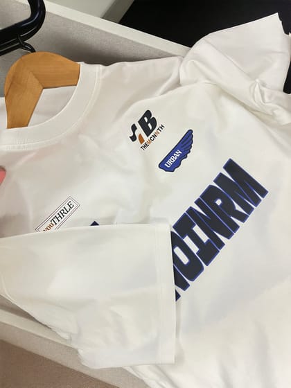 White jenoinrm tshirt