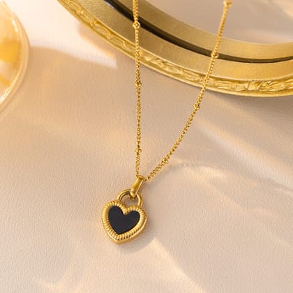 WHITE AND BLACK SHELL PENDANT