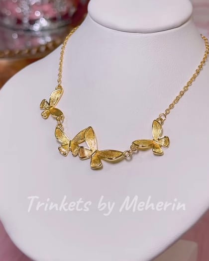 Butterfly neckpiece