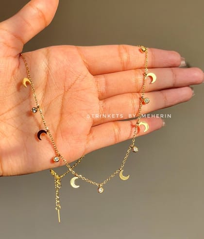 Half moon charm neckpiece