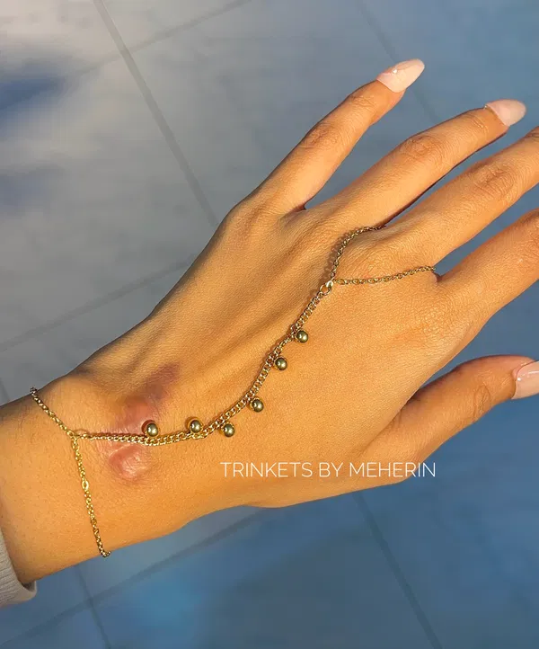 Gold ball hand chain