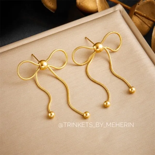 Bow tassel earring