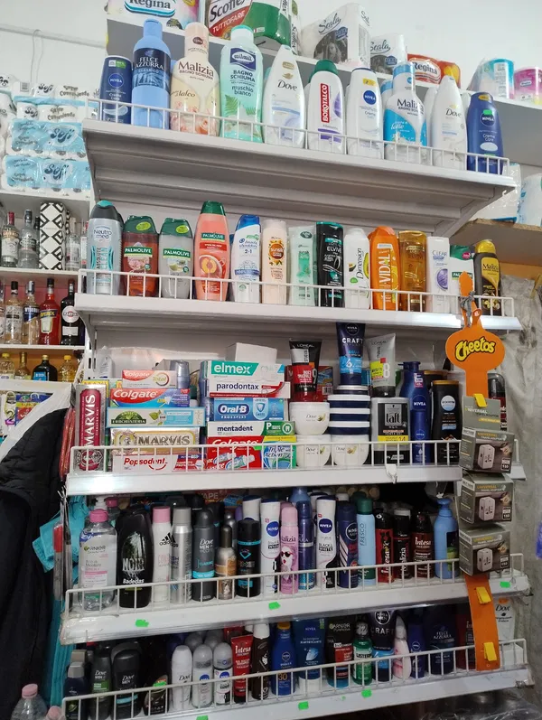 COSMETICS..SHAMPOO.HAIR GEL.TOOTH PASTE+BRASH.BODYLOTIONPROFUMO