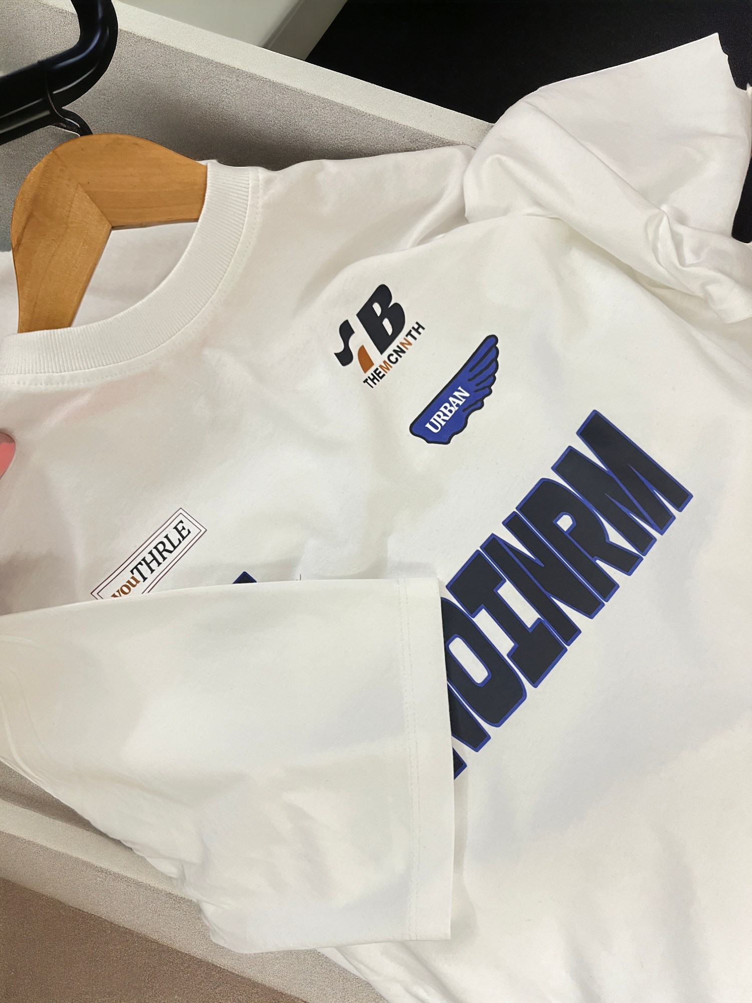 White jenoinrm tshirt